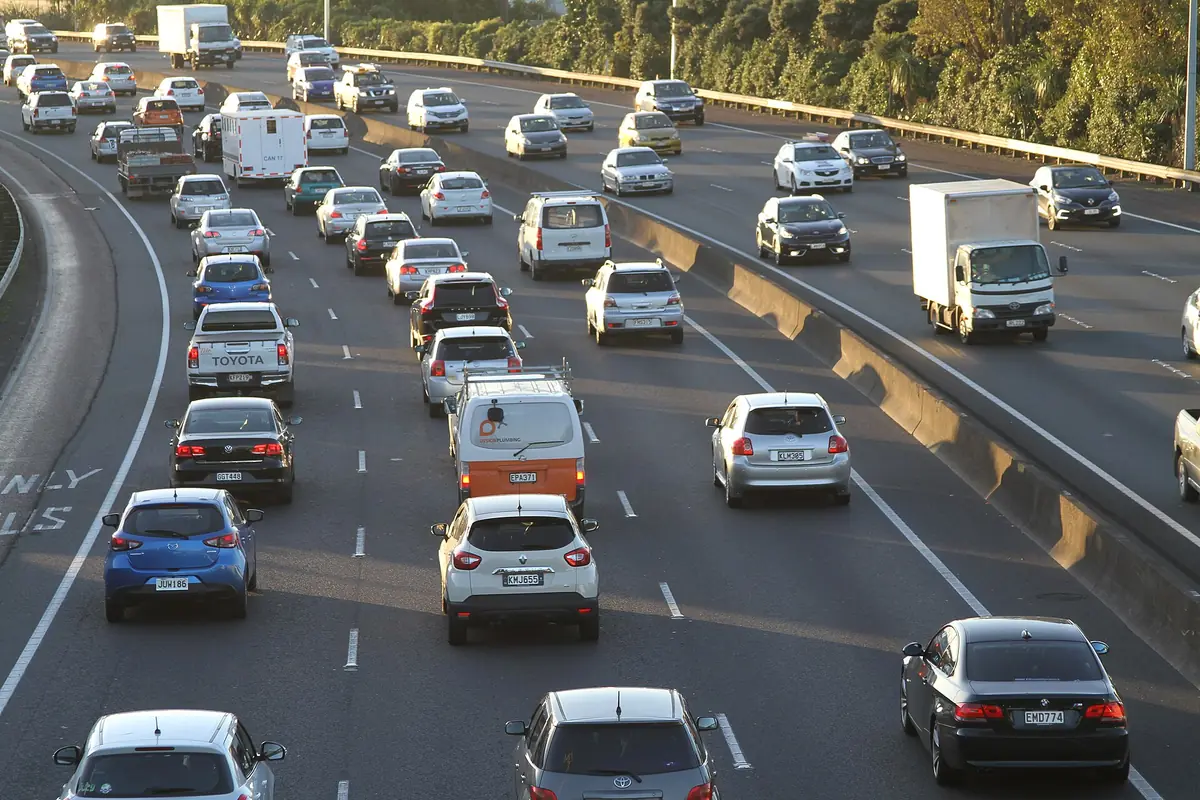 Motorway traffic with cars, a van and a truck boxed and lane lines traced
